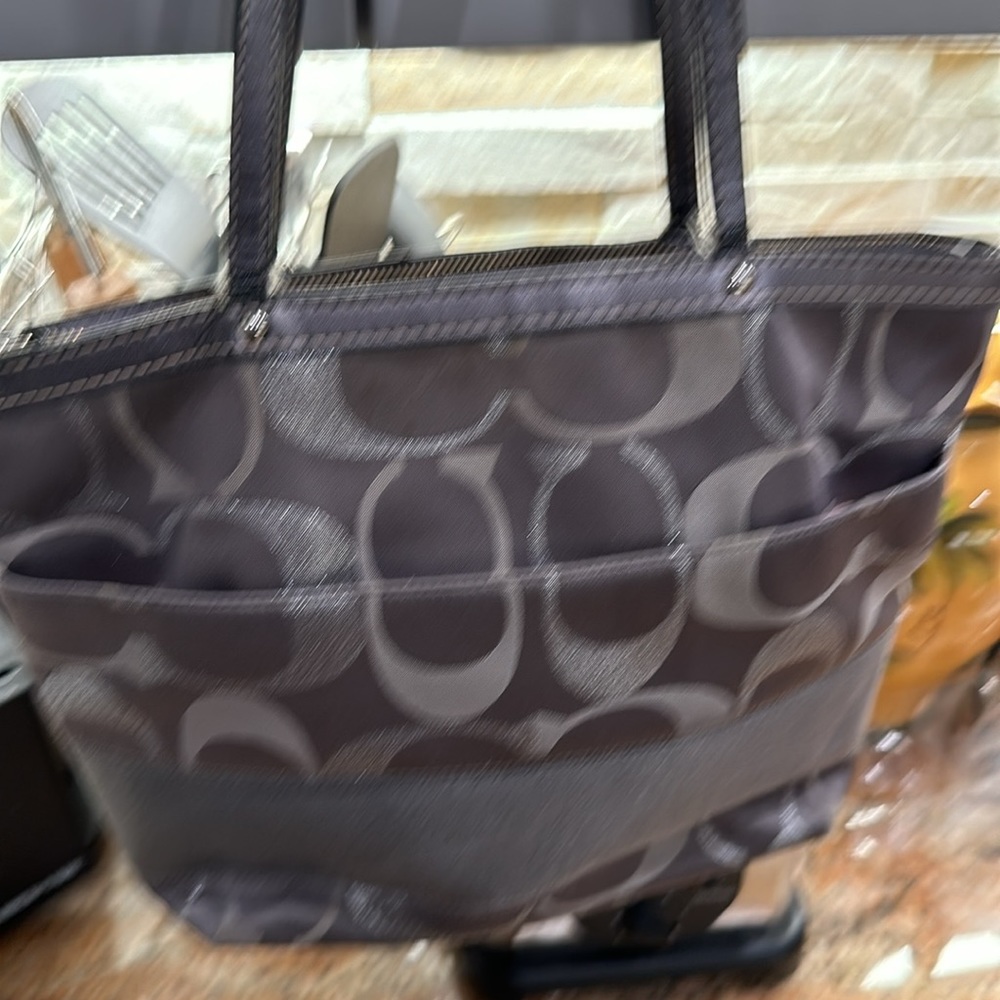 Auth Coach Signature design nice tote -gray and silver some calls outs on straps
